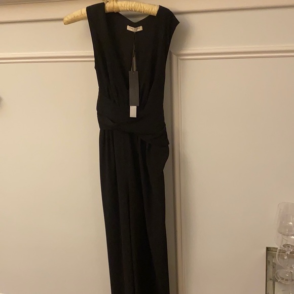 black jumpsuit with plunging v neck, never worn,All Products : American Fashion Style Bags On Sale